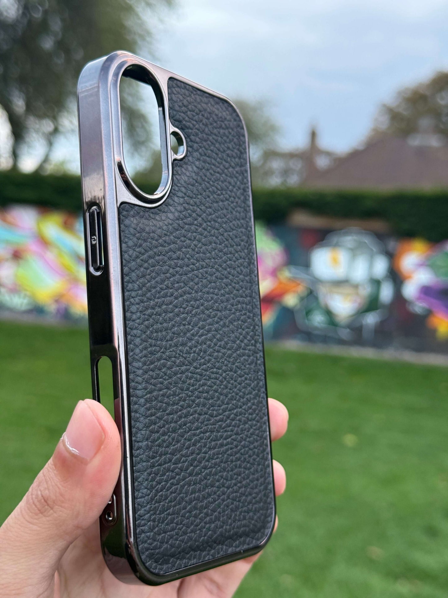 Premium Protection Kit iPhone 17 displayed in hand, showcasing the handcrafted leather back case design.
