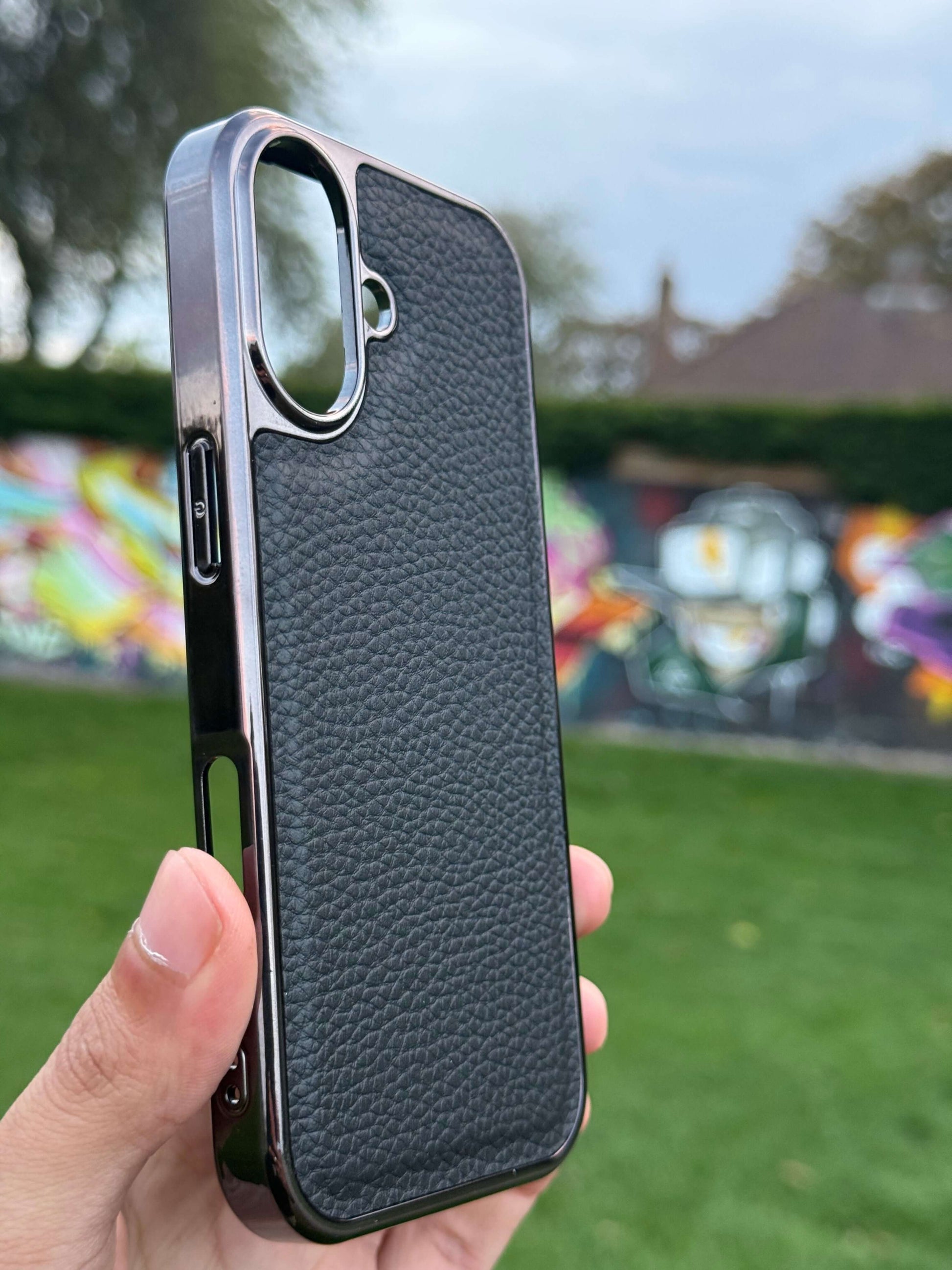 Premium Protection Kit iPhone 17 displayed in hand, showcasing the handcrafted leather back case design.